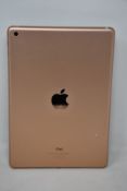 A pre-owned Apple iPad 9.7