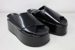A pair of as new Junya Watanabe crossover leather platform sandals (No box, approximately UK 8).
