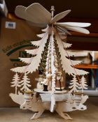 A boxed as new Dregeno wooden display pyramid with a Christmas figure (085/629).