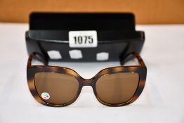 A pair of as new Ralph Lauren sunglasses.