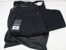 A pair of as new Saint Laurent 597052 skinny fit black jeans (Size 33).