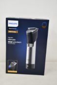 A boxed as new Philips 9000 prestige beard trimmer (BT9810/13).