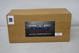 A TWI airsoft Bullpup conversion kit (NOTE: The airsoft this kit is used for is unknown, viewing