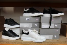 Five pairs of pre owned Alexander McQueen trainers (All various sizes) (All got boxes).