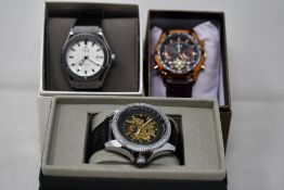 Three men's as new Vault automatic watches.