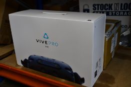 A boxed as new HTC VIVE Pro Eye VR Kit (P/N: 99HARJ001-00) (Box sealed).