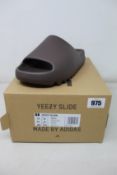 A pair of as new Adidas Yeezy Slide (UK 10).