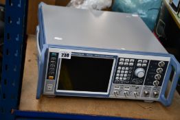A pre-owned Rohde & Schwarz SMW200A vector signal generator (Damaged, dented on side. No cables or