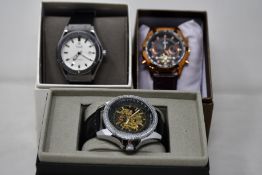 Three men's as new Vault automatic watches.