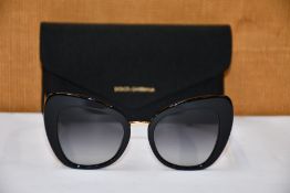 A pair of as new Dolce & Gabbana sunglasses.