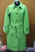 An Victoria Beckham trench coat style coat in green (No size, sample item).