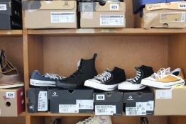 Five pairs of assorted as new Converse footwear.