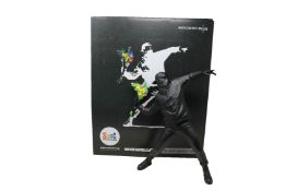 A Medicom Toy - Banksy Brandalism Flower Bomber Figure - Black Gesso Version (Slight damage to stalk