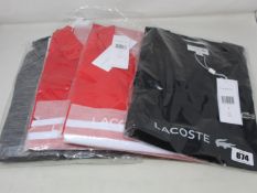 Two as new Lacoste red polo tops (Sizes FR 4), black T-shirt (FR 5) and zip up track top (Size 34).