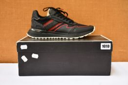 A pair of as new Michael Kors Miles sneakers (EU 45).