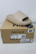 A pair of as new Adidas Yeezy Slide (UK 4).