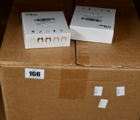 A box of i7s wireless earbuds with charging cases (Approximately 110 items).