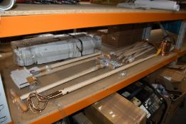 Various PKS copper garden tools: Four lawn edgers, two cultivators and a watering can, along with