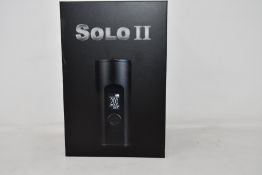 A boxed as new Arizer Solo II Vaporizer in Carbon Black (NOTE: UK power adapter required) (NOTE: