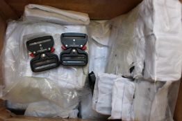 A large quantity of CyberDog cyber belt buckles.