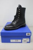 A pair of as new Stuart Weitzman Sondra boots (UK 4).