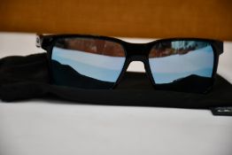 A pair of as new Oakley Portal X sunglasses.