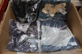 Thirty items of assorted as new Fox Racing clothing to include T-shirts, trousers, shorts and caps.