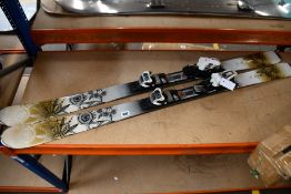 A pair of pre-owned K2 Luv Glam 76 skis (May be slightly damaged).