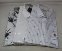 Three assorted as new Ted baker shirts (All size 3?).
