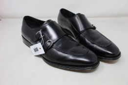 A pair of as new Salvatore Ferragamo shoes in black (Size 11.5 - soles immaculate, light crease on