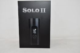 A boxed as new Arizer Solo II Vaporizer in Carbon Black (NOTE: UK power adapter required) (NOTE: