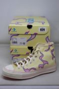 Two pairs of as new Golf Le Fleur x Converse Chuck 70 Yellow Flame sneakers (UK 7.5).