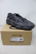 A pair of as new Adidas Yeezy 500 (UK 11.5).