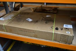 A Safavieh Malibu outdoor wooden tea cart.