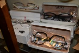 Eight pairs of as new Glas reading glasses.