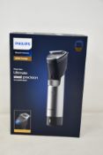 A boxed as new Philips 9000 prestige beard trimmer (BT9810/13).