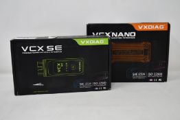A VXDIAG VCX Nano and a VXDAIG VCX SE.