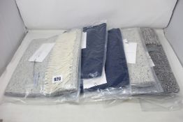 Five as new Mourne Textiles Tweed Emphasize scarves (RRP from£80 each).