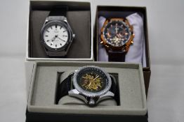 Three men's as new Vault automatic watches.