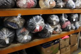 Eleven bags of assorted clothing and related items.