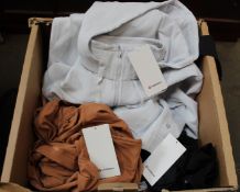 A quantity of assorted as new LuluLemon fitness wear (Approximately 25 items - Please not items have