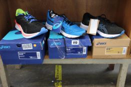 Three pairs of men's as new Asics trainers; Novablast (UK 10.5), GT-1000 10 (UK 6) and Gel-Run 33 (