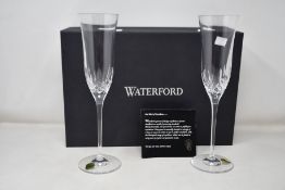 An as new Waterford Lismore Essence Champ Flute set of 6 (156433).