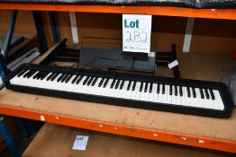 A pre-owned Casio CDP-S100 portable digital piano with stand and pedal.