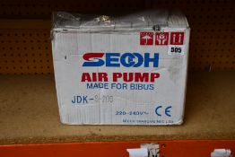 A SECOH JDK-S-200 air pump.