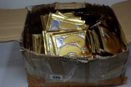A large quantity of unbranded crystal collagen gold powder eye masks.