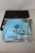 A pair of as new Versace boxer America Mare Uomo swim shorts in splash / Oro (GB 42).