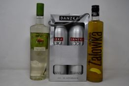 A twin pack of Danzka vodka (2 x 1ltr), Zubrowka Bison Grass vodka (700ml), Zalowka vodka and banana