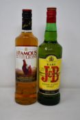 Four bottles of J&B blended scotch whisky (1 x 700ml, 3 x 1ltr) and a famous Grouse (700ml).