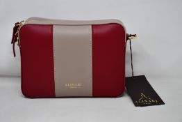 An as new Alinari Firenze Flavia crossbody bag in red/taupe.